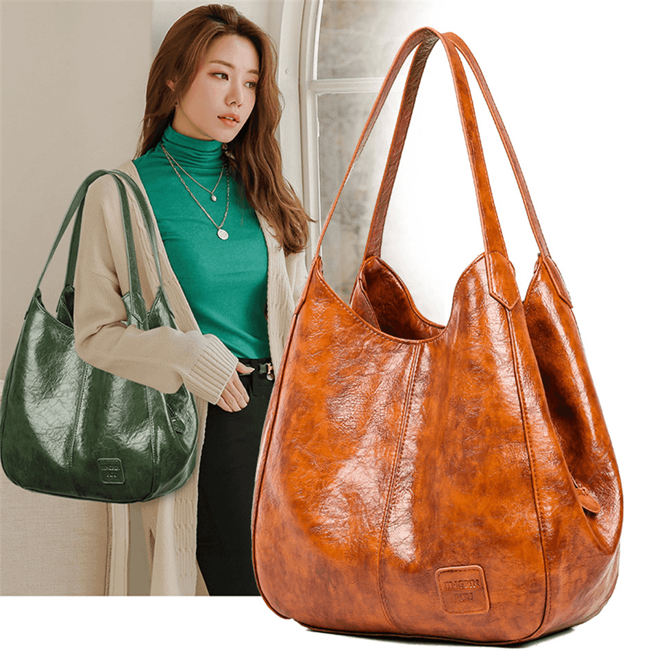 תיק קל לנשיאה על הכתף בחלוקה פרקטית נבונה של תאים ללוק נשי חריף - לה איסלה