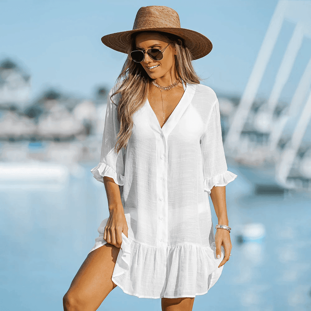 שמלת חוף שקופה בגיזרה נשית מתנפנפת ללוק מושקע מעל הבגד ים ולהופעה טרנדית - לה איסלה