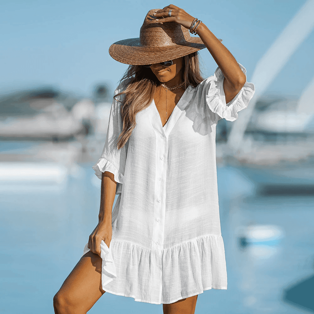 שמלת חוף שקופה בגיזרה נשית מתנפנפת ללוק מושקע מעל הבגד ים ולהופעה טרנדית - לה איסלה