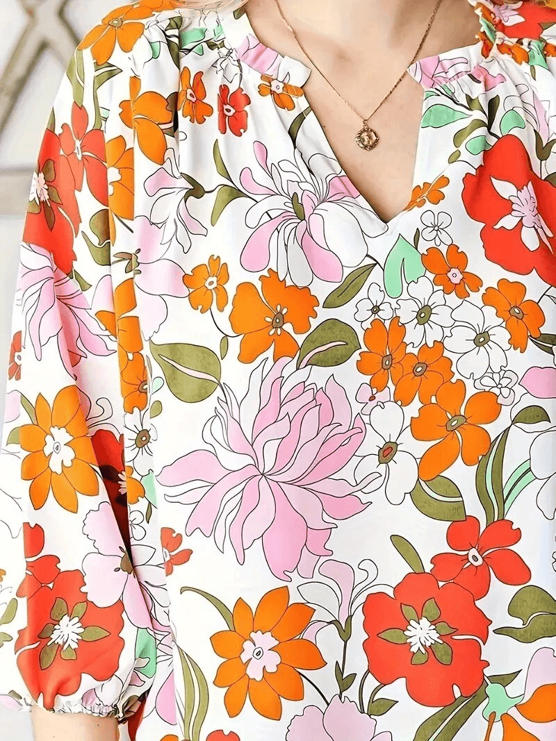 חולצה אביבית בגימור פרחוני מקסים ללוק נשי שמח ולהופעה אופטימית שלך - לה איסלה