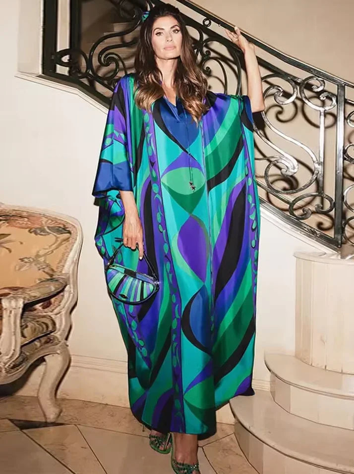 שמלת סטאן מקסי בגווני כחול ירוק ללוק אופנתי מרהיב להופעה נשית מקסימה