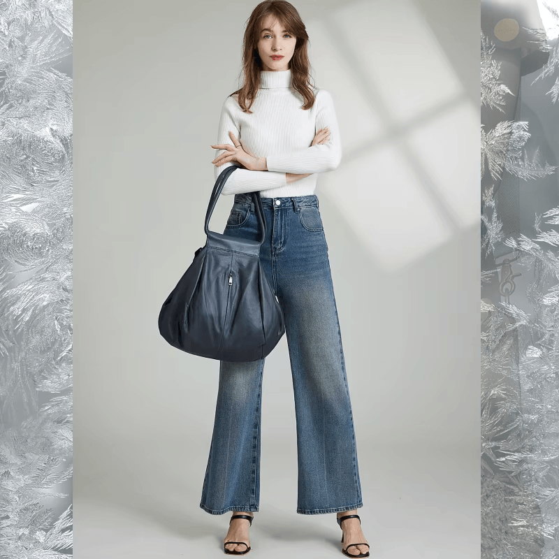 תיק עור בעיצוב חדשני להופעה מגוונת ומדליקה ללוק של אישה אופנתית חזקה