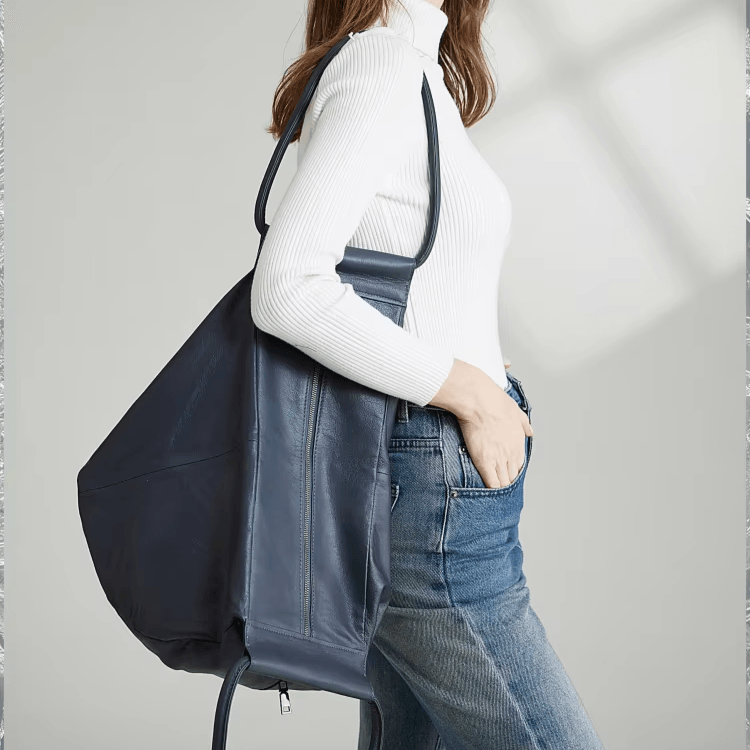 תיק עור בעיצוב חדשני להופעה מגוונת ומדליקה ללוק של אישה אופנתית חזקה