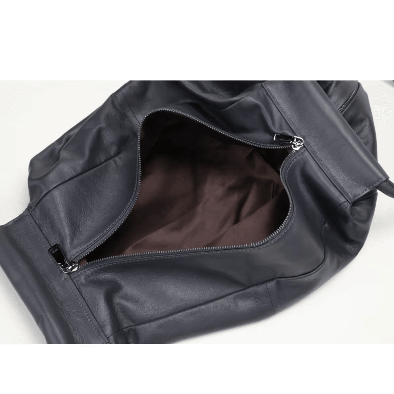 תיק עור בעיצוב חדשני להופעה מגוונת ומדליקה ללוק של אישה אופנתית חזקה