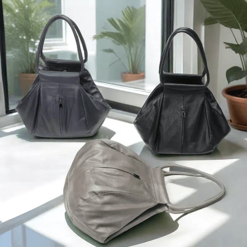 תיק עור בעיצוב חדשני להופעה מגוונת ומדליקה ללוק של אישה אופנתית חזקה