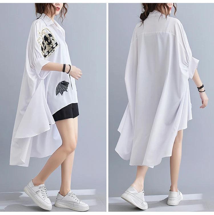 מכופתרת טוניקה בגיזרת אוברסייז אסימטרית מקסימה ללוק מושלם לעונה - לה איסלה: אופנה וחזיות פרימיום