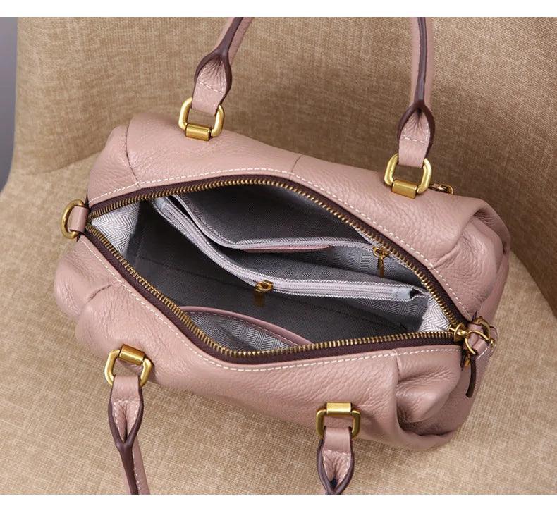 תיק עור יוקרתי בחלוקה פרקטית של תאים לנשיאה של דברי ערך וללוק נשי משודרג - לה איסלה