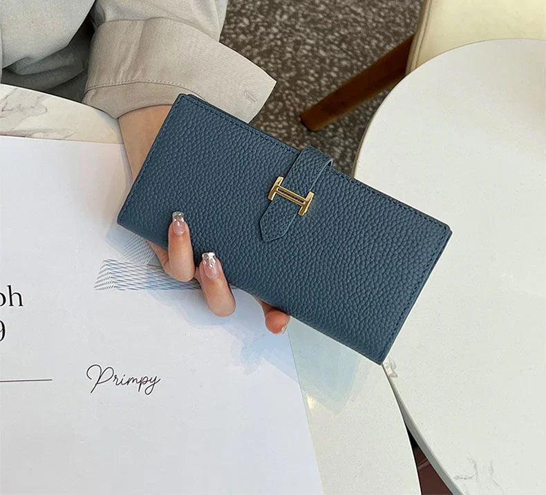 ארנק עור מקורי בגימור איטלקי קליל ודק להופעה נשית יוקרתית ובחלוקה נבונה של תאים