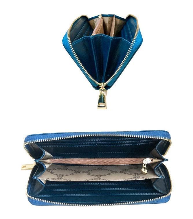 ארנק אלגנטי מעור מקורי בעיצוב חדשני וטרנדי להופעה של אישה חזקה ועצמאית