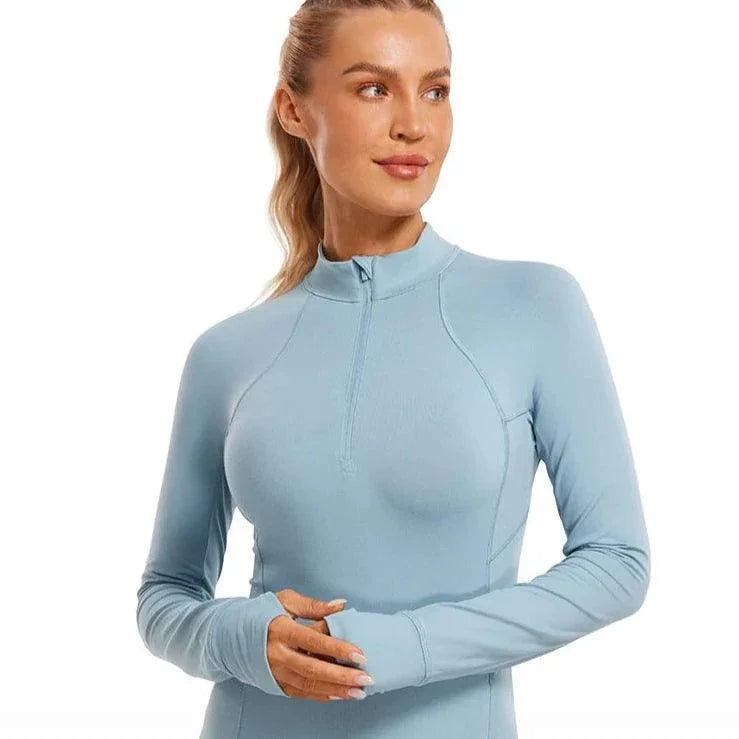 חולצת ספורט מנדפת זיעה עם חצי רוכסן לפעילות ספורטיבית והופעה אופנתית