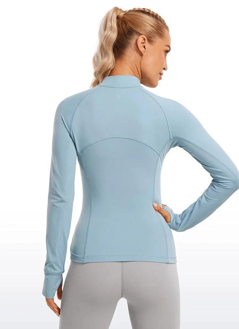 חולצת ספורט מנדפת זיעה עם חצי רוכסן לפעילות ספורטיבית והופעה אופנתית