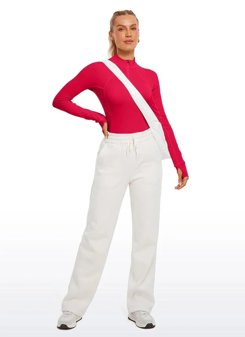 חולצת ספורט מנדפת זיעה עם חצי רוכסן לפעילות ספורטיבית והופעה אופנתית