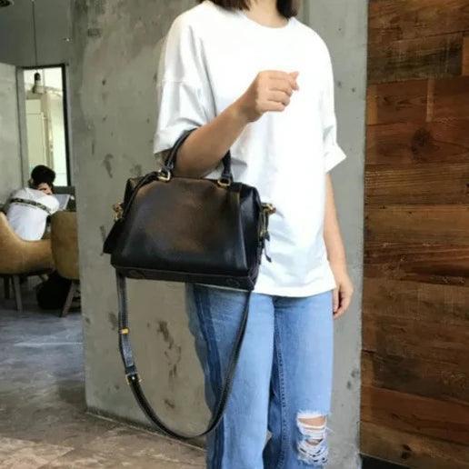 תיק עור יוקרתי בחלוקה פרקטית של תאים לנשיאה של דברי ערך וללוק נשי משודרג - לה איסלה