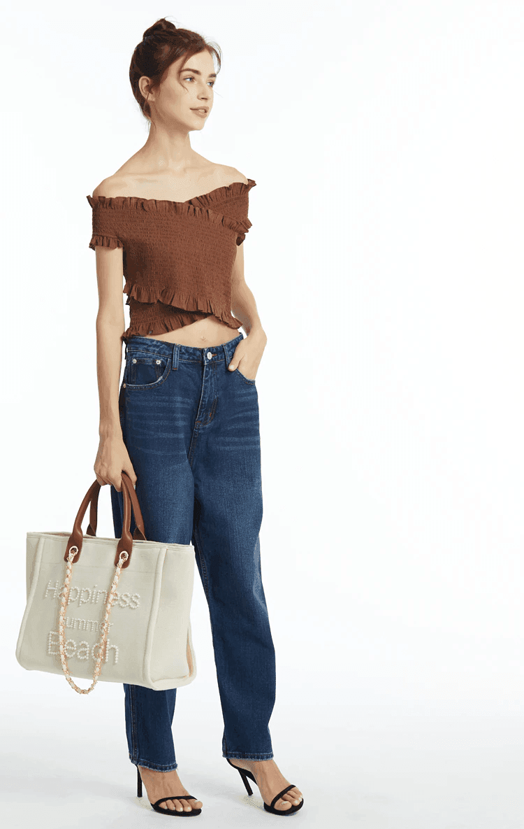 תיק בד של מותג ספרדי בשילוב חרוזי פנינה ובעיצוב מרשים להופעה נשית קלילה וטרנדית - לה איסלה