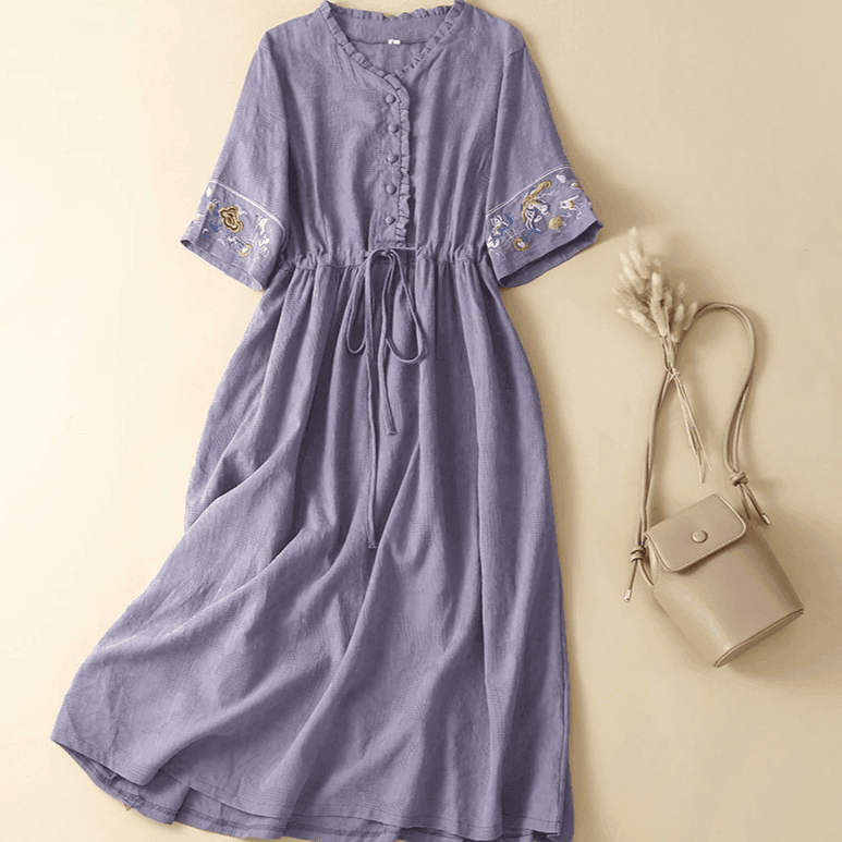 שמלת פשתן מושלמת עם כיסים בגימור אתני מהפנט להופעה נשית מקסימה - לה איסלה