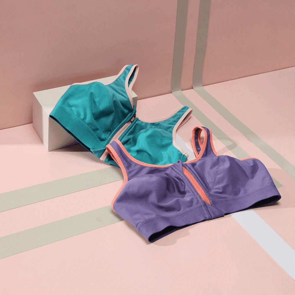 חזייה ספורטיבית עם סגירת רוכסן קידמית להופעה היחידה שמחזיקה את החזה נכון - לה איסלה