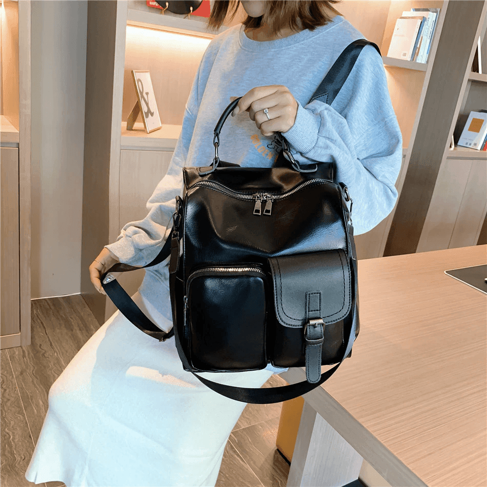 תיק גב מושלם בחלוקת פנטנט של שלושה תאים לנשיאה של חפצים בגדלים שונים ללוק נשי - לה איסלה