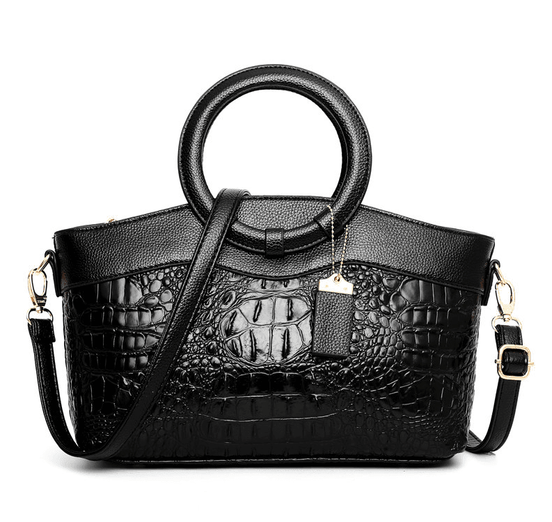 תיק עור יוקרתי בגיזרה מנוחשת מאיטליה להופעה משובחת וללוק שמשדרג לך את ההופעה - לה איסלה