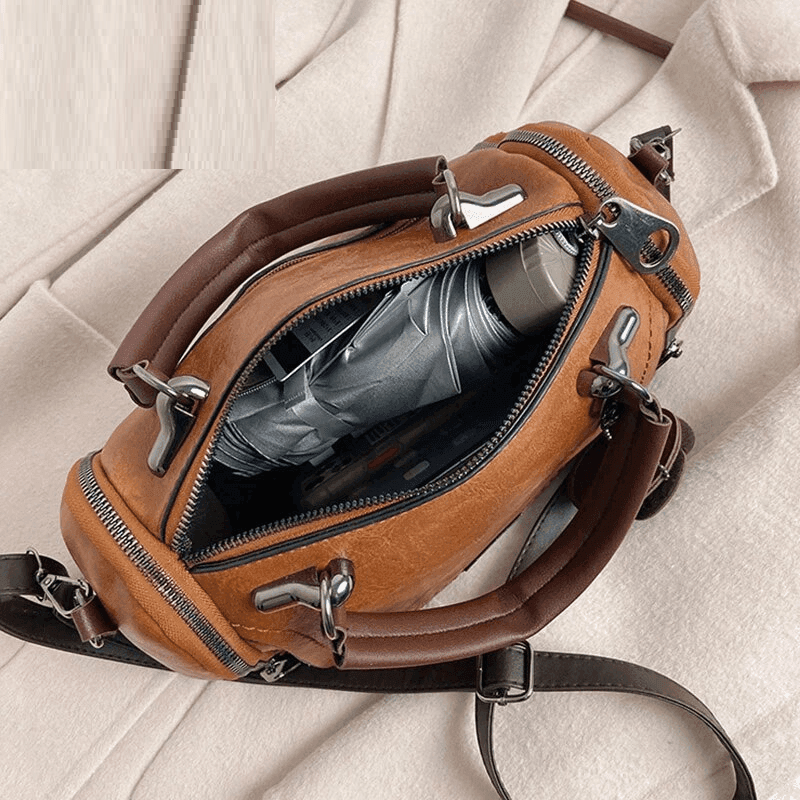 תיק אישי בגימור פרח אופנתי לנשיאה של חפצים אישיים וללוק איטלקי משובח - לה איסלה