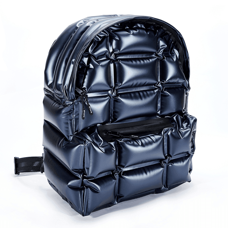 תיק פוף מהפנט של מעצב ממילאנו בחלוקה נבונה של תאים ללוק נשי סוחף - לה איסלה