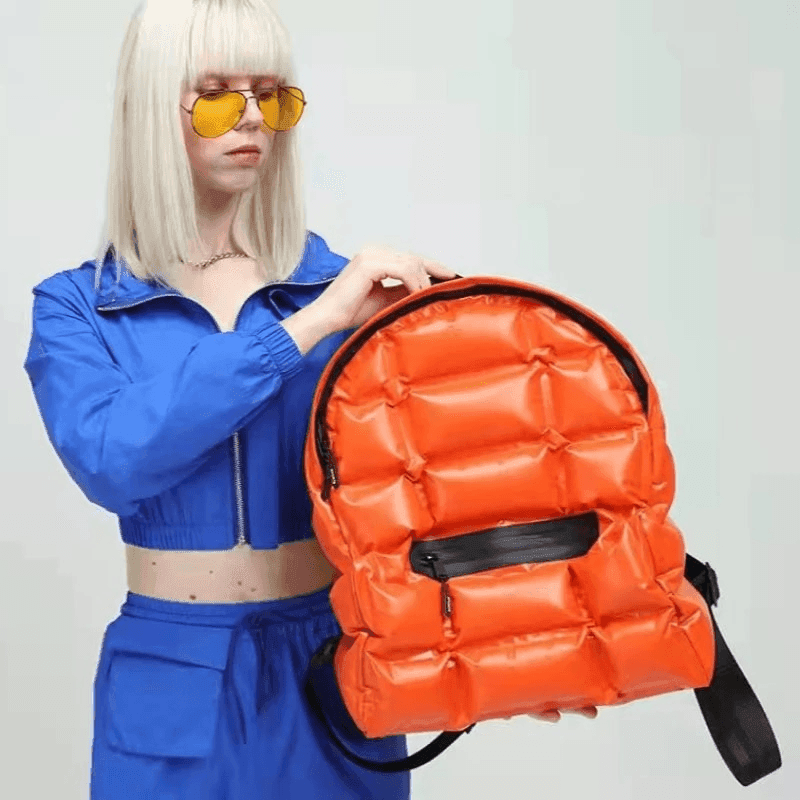 תיק פוף מהפנט של מעצב ממילאנו בחלוקה נבונה של תאים ללוק נשי סוחף - לה איסלה