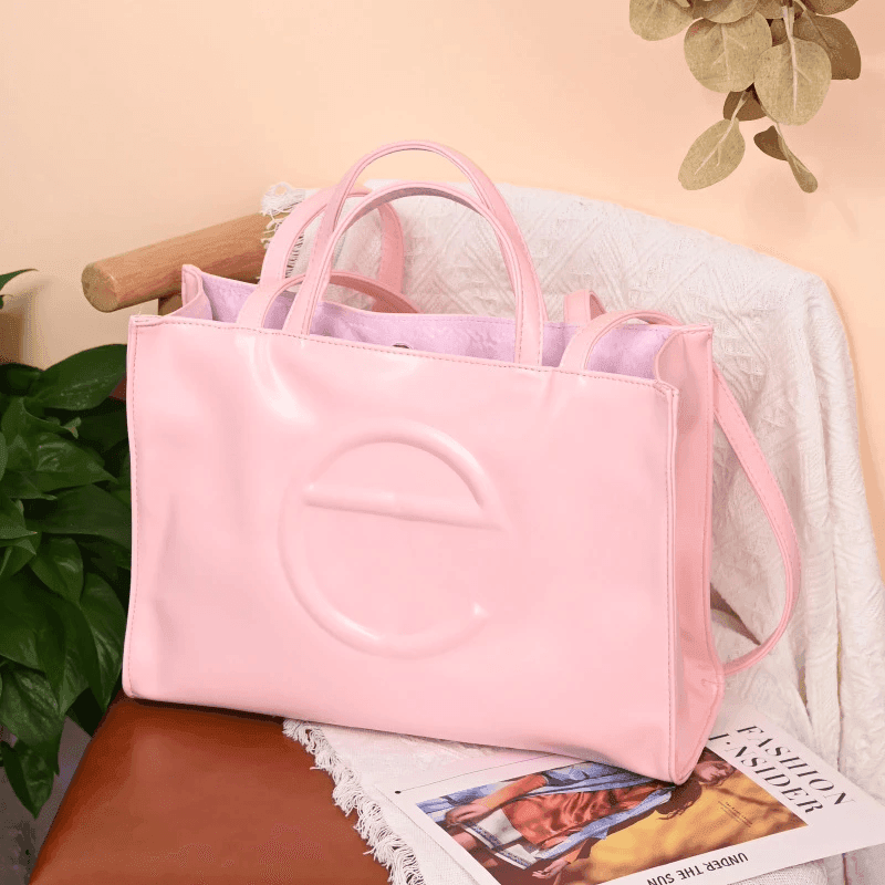 תיק כתף של מעצב ישראלי בגיזרה קייצית קלילה להופעה שתמיד תרגישי בה חו"ל - לה איסלה