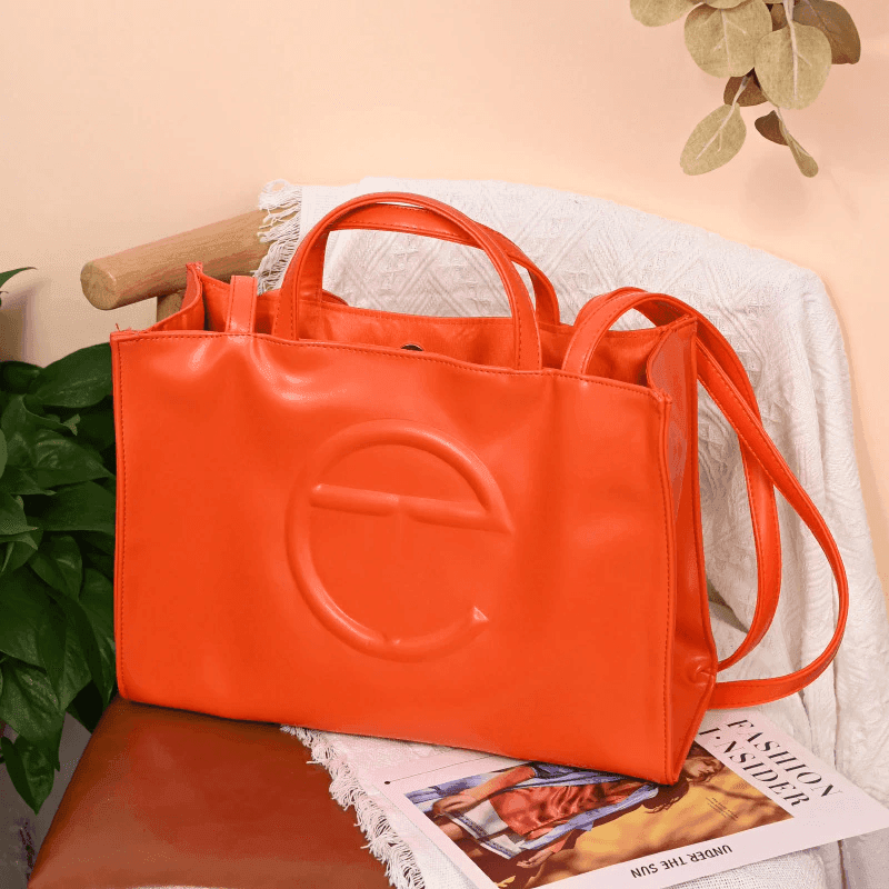 תיק כתף של מעצב ישראלי בגיזרה קייצית קלילה להופעה שתמיד תרגישי בה חו"ל - לה איסלה