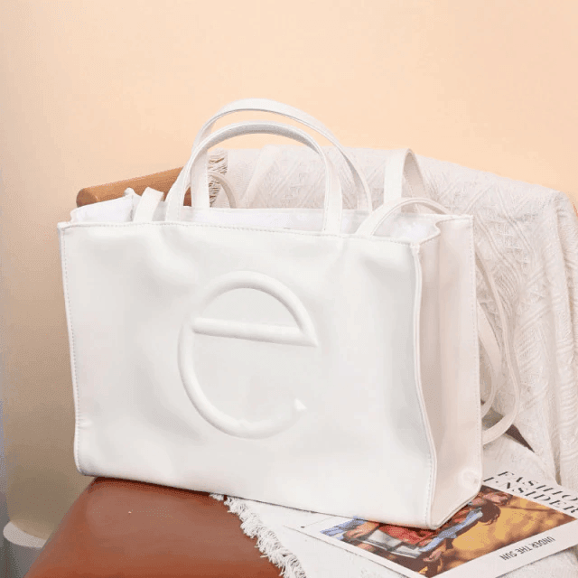 תיק כתף של מעצב ישראלי בגיזרה קייצית קלילה להופעה שתמיד תרגישי בה חו"ל - לה איסלה