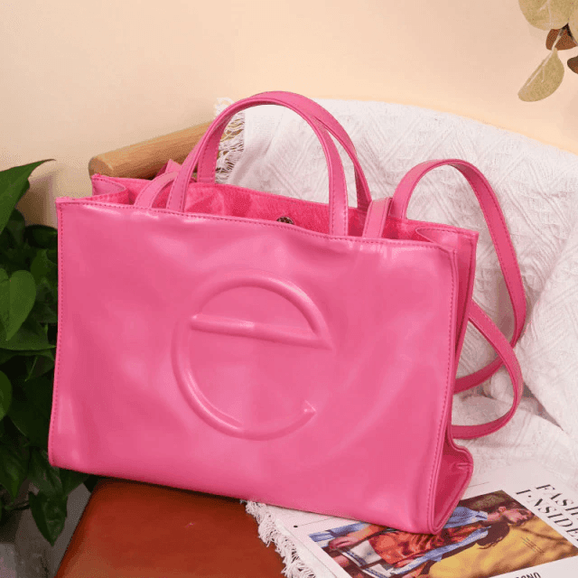 תיק כתף של מעצב ישראלי בגיזרה קייצית קלילה להופעה שתמיד תרגישי בה חו"ל - לה איסלה