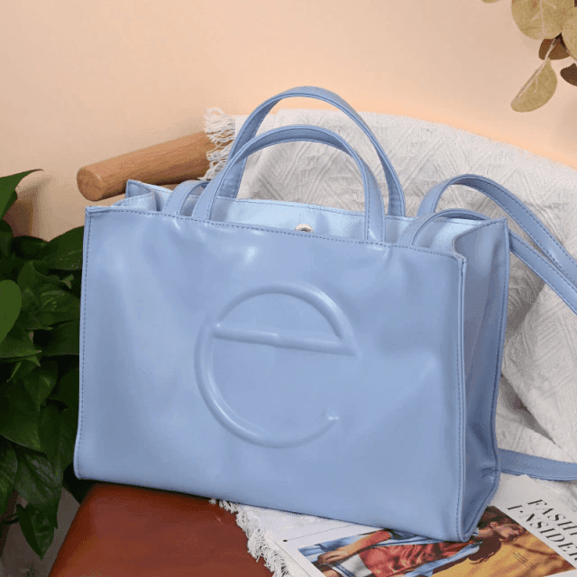 תיק כתף של מעצב ישראלי בגיזרה קייצית קלילה להופעה שתמיד תרגישי בה חו"ל - לה איסלה