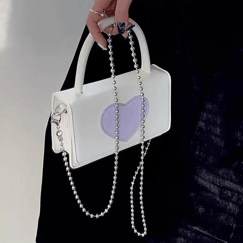 תיק מיני של מעצב איטלקי לנשיאה של חפצים אישיים ללוק מקסים וייחודי - לה איסלה