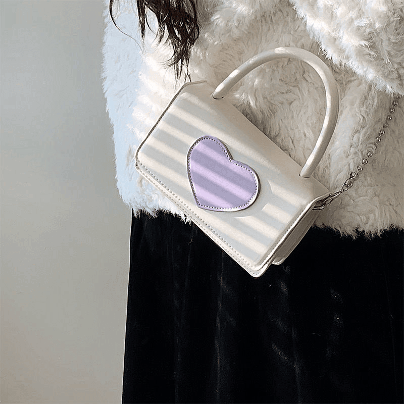 תיק מיני של מעצב איטלקי לנשיאה של חפצים אישיים ללוק מקסים וייחודי - לה איסלה