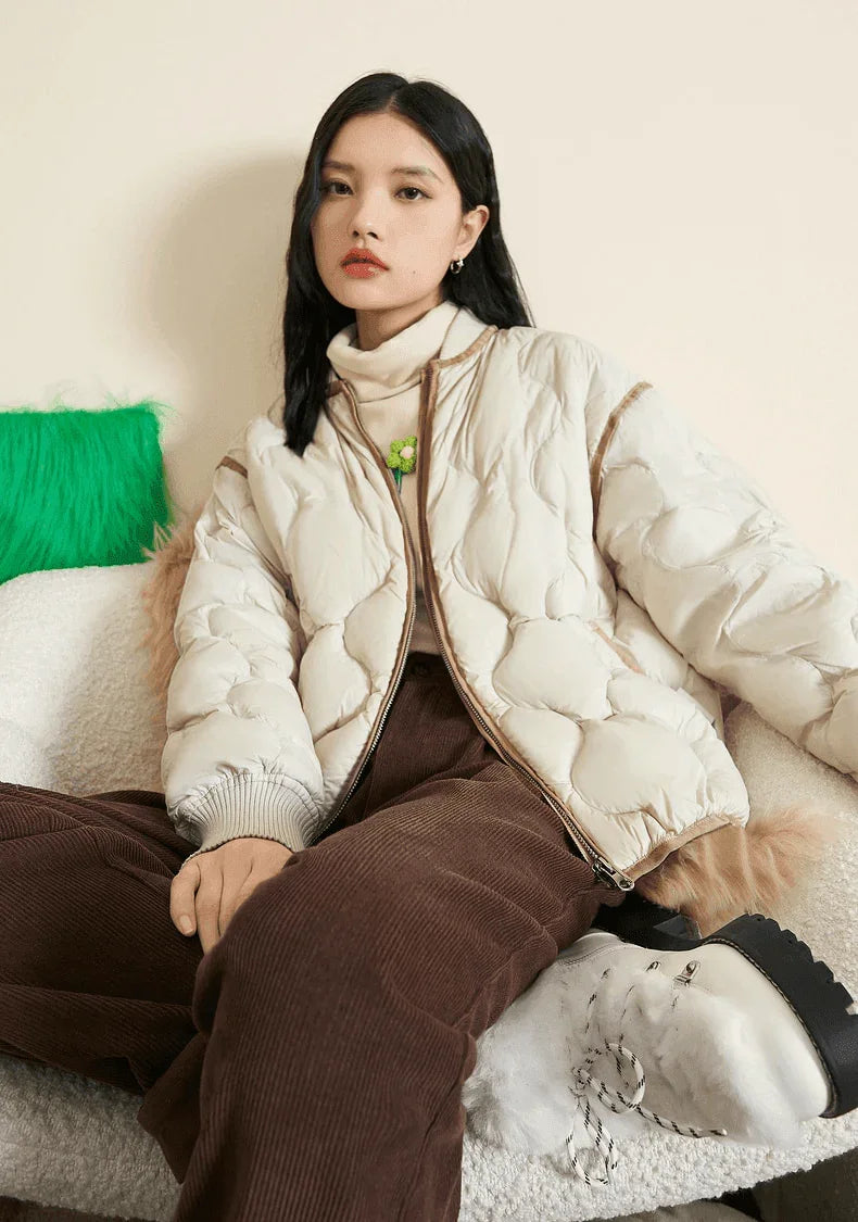 מעיל פוך מהפנט בגימור ספורט אלגנט להופעה של אישה שיוצאת בהצהרה - לה איסלה