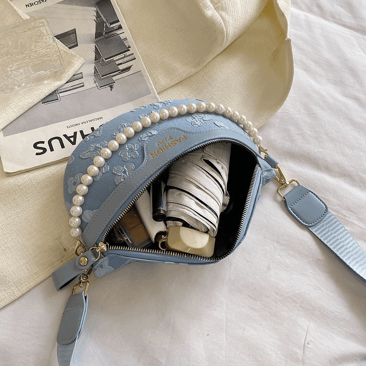 תיק בסיגנון פאוץ איטלקי בגימור פנינים מנצח להופעה הכי כריזמתית שלך - לה איסלה