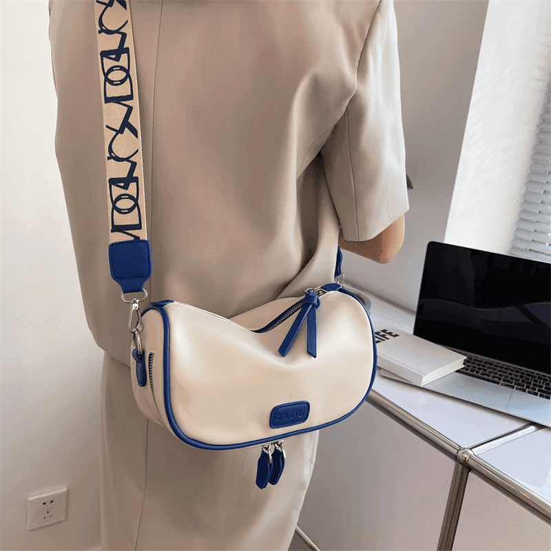 תיק קלאץ מ-ש-ג-ע עם רצועה מעוטרת להופעה של אישה כריזמתית וללוק סוחף - לה איסלה