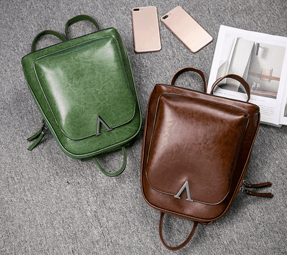 תיק גב מעור איטלקי בגיזרה מכילה ועם הרבה תאים פרקטים ללוק אופנתי כובש - לה איסלה