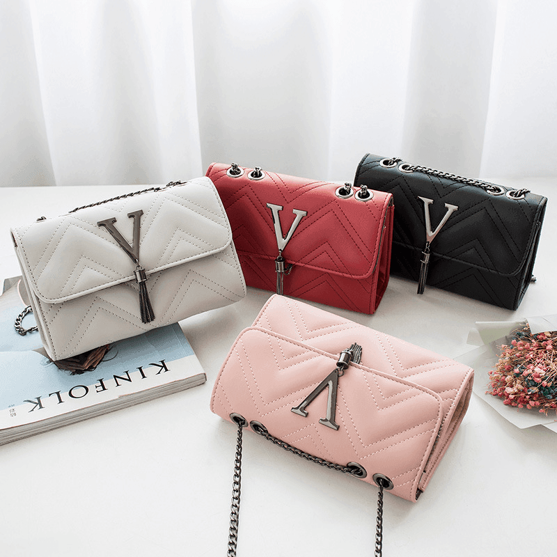 תיק בסיגנון 'איב סאן לורן' לנשיאה של חפצי ערך ללוק מסוגנן - לה איסלה