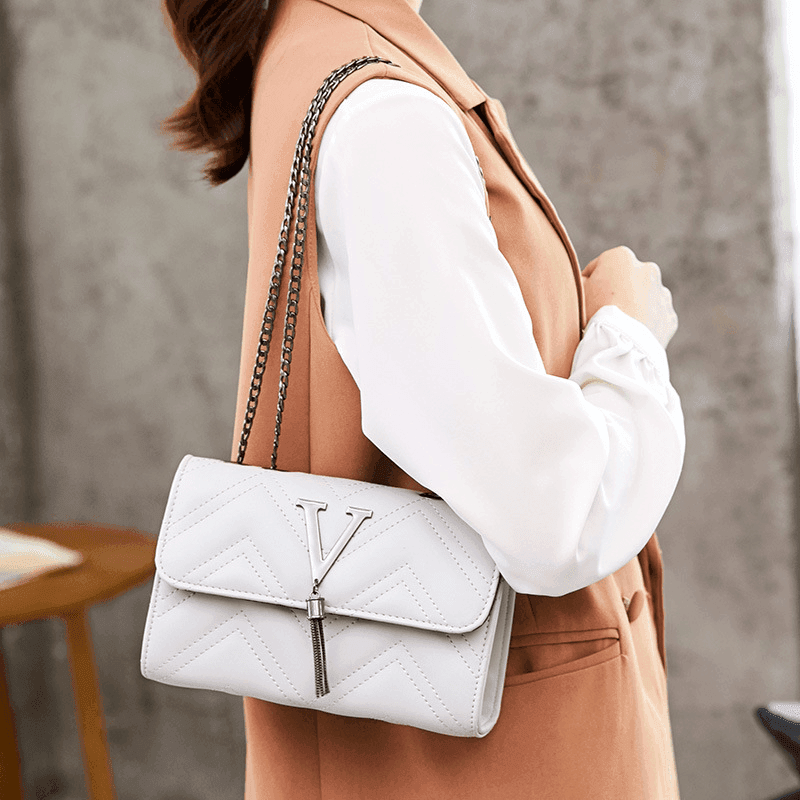 תיק בסיגנון 'איב סאן לורן' לנשיאה של חפצי ערך ללוק מסוגנן - לה איסלה