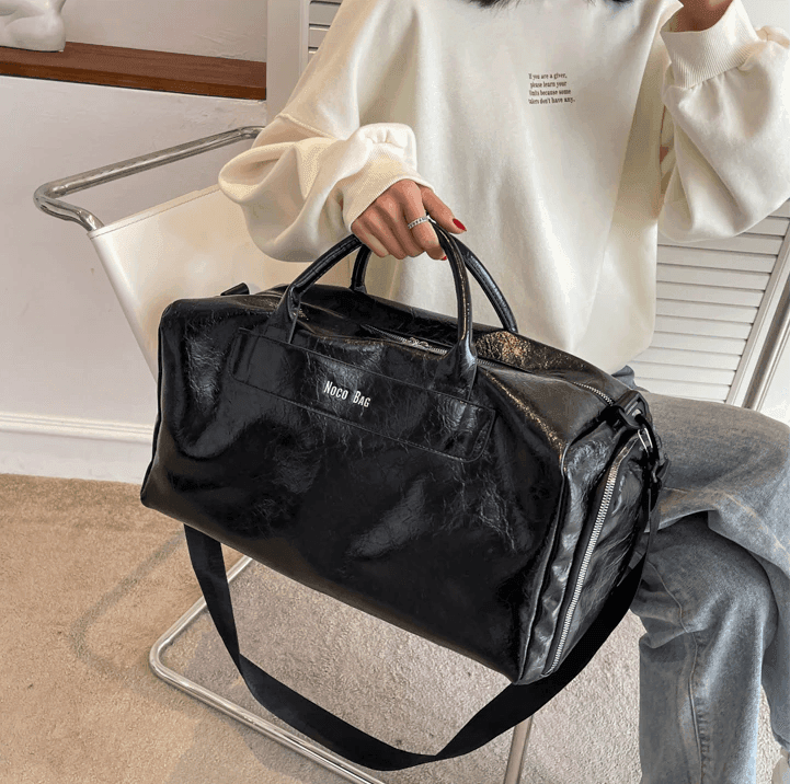 תיק עור גדול בחלוקה חכמה של תאים ללוק פרקטי משגע ולהופעה אופנתית במיוחד - לה איסלה