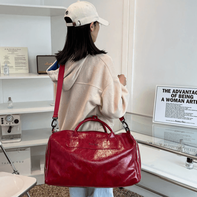 תיק עור גדול בחלוקה חכמה של תאים ללוק פרקטי משגע ולהופעה אופנתית במיוחד - לה איסלה