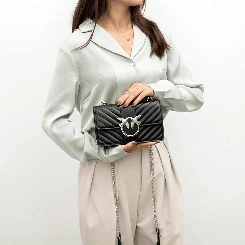 תיק נשי של ציפורי האהבה של מעצב איטלקי בגיזרה אלגנטית ללוק מעצים לערב - לה איסלה