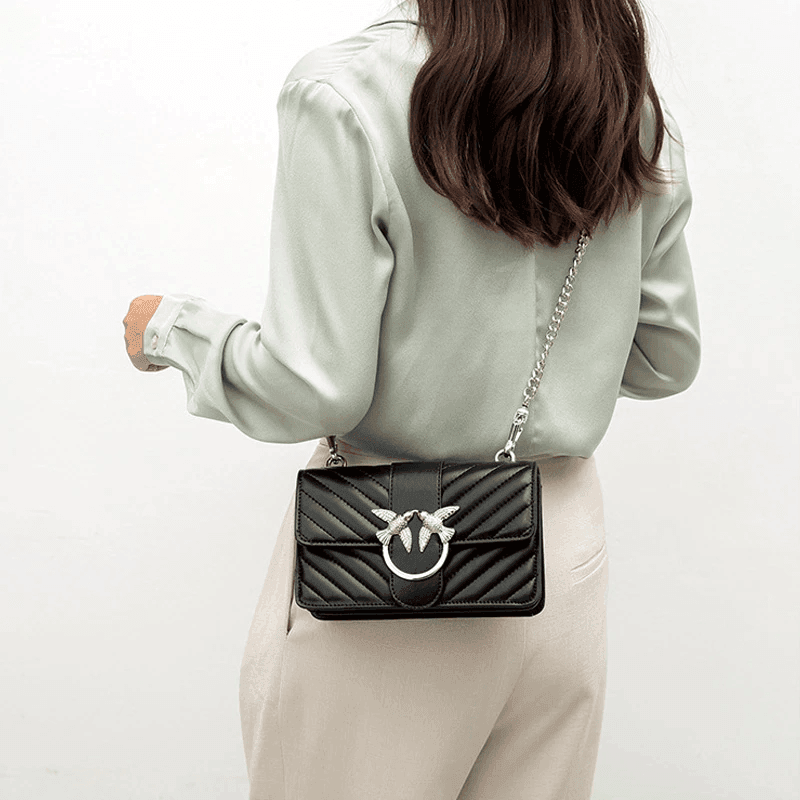 תיק נשי של ציפורי האהבה של מעצב איטלקי בגיזרה אלגנטית ללוק מעצים לערב - לה איסלה