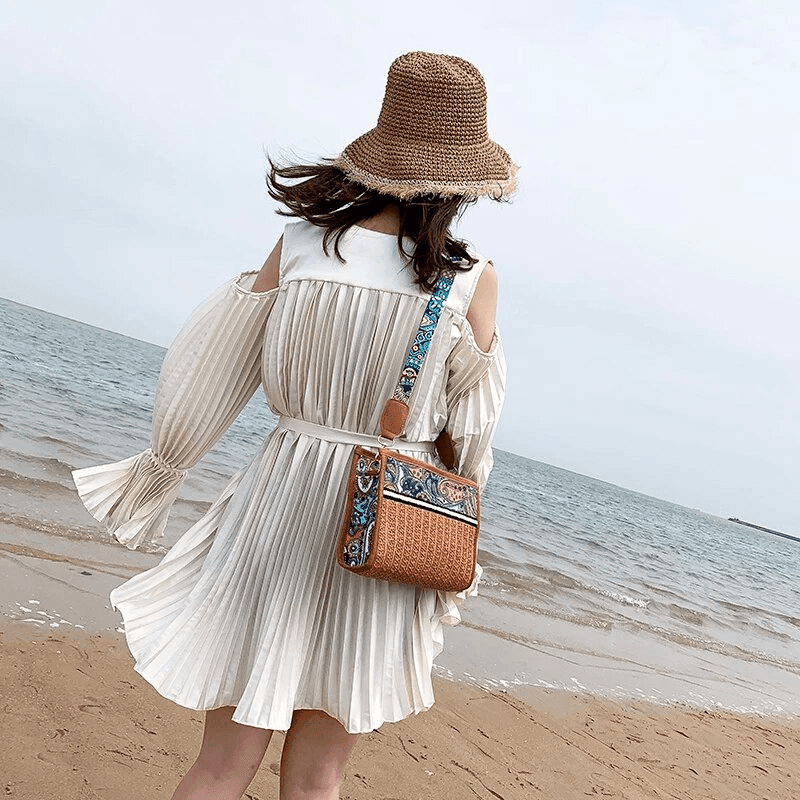 תיק אתני קטן בגימור של ארנק מרהיב של מעצב איטלקי ללוק שמיימי - לה איסלה