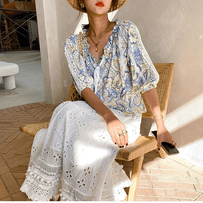 חצאית פליסה מתחרה משגעת בעיצוב נשי חגיגי ולבן להופעה של אישה שמרימה לעצמה - לה איסלה