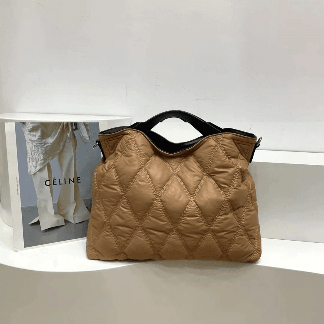 תיק פוץ מ-ש-ג-ע בגיזרתשק מכיל לנשיאה של כמות חפצי ערך ללוק נשי מושלם - לה איסלה