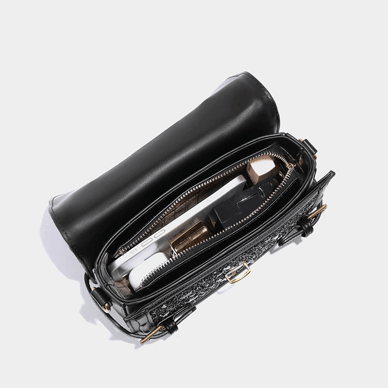 תיק מעצב בגימור נוצץ לערב להופעה נשית בולטת וללוק שאי אפשר לא לבלוט בו - לה איסלה