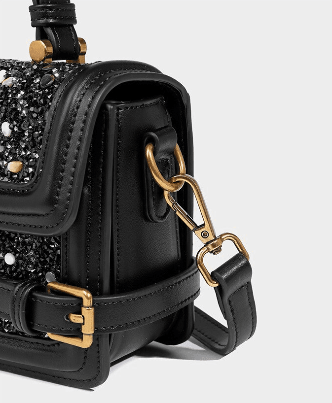 תיק מעצב בגימור נוצץ לערב להופעה נשית בולטת וללוק שאי אפשר לא לבלוט בו - לה איסלה