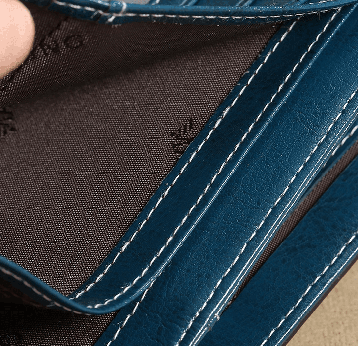 ארנק עור מקורי מאיטליה של מעצב בגיזרה פרקטית ובחלוקה חכמה של תאים ללוק אופנתי - לה איסלה