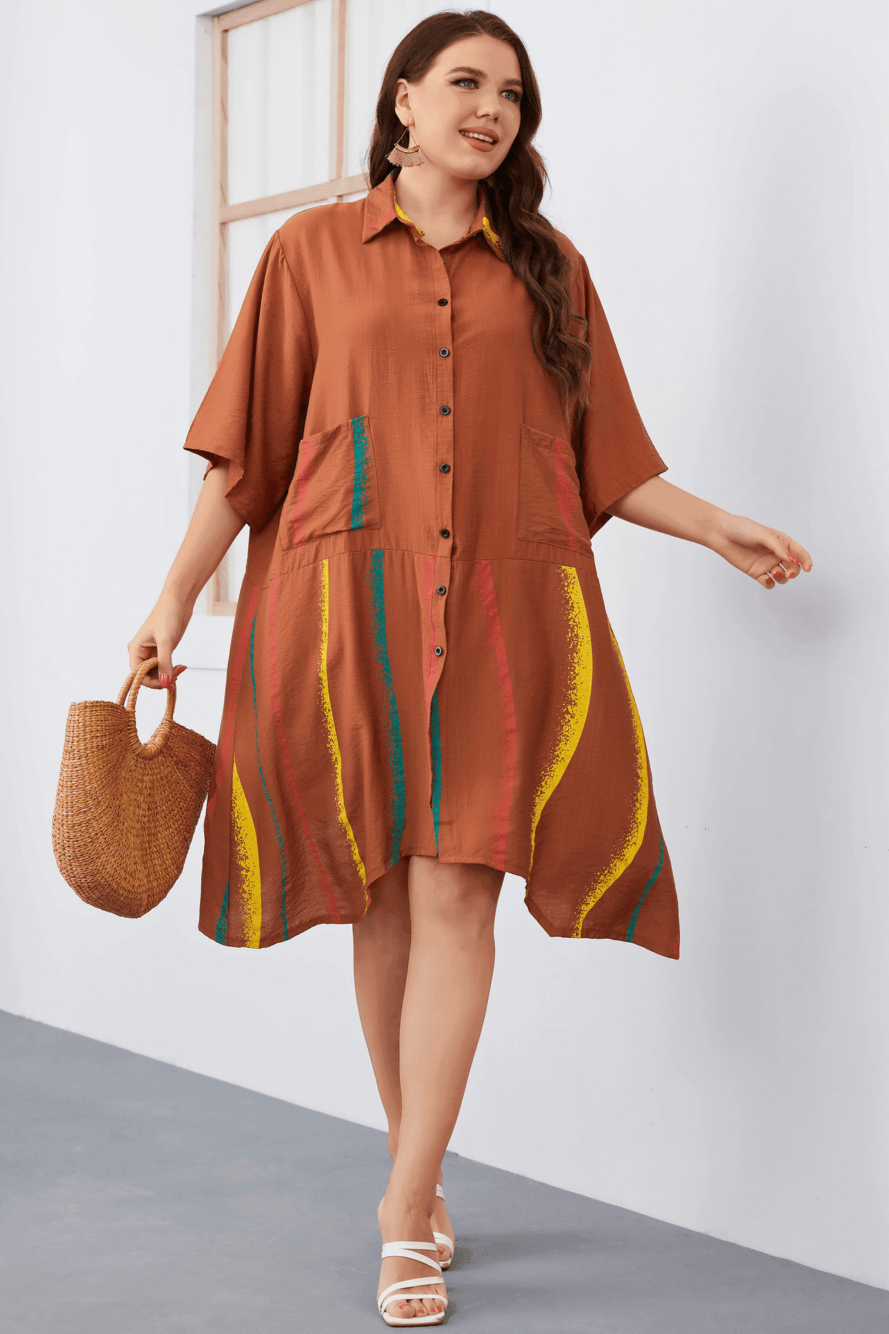 שמלת טוניקה של מעצב ספרדי בגימור מדליק שנותן לך דגש בקימורים הנכונים - לה איסלה