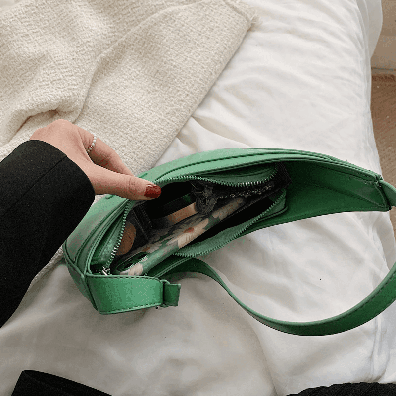 תיק של מעצב מספרד בגיזרה נשית פרקטית לנשיאה של חפצים אישיים ללוק טרנדי - לה איסלה